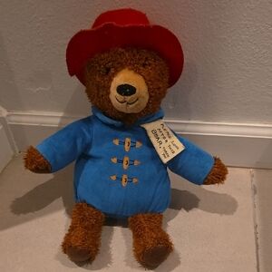 Charming Brown Teddy Bear in Blue Coat and Red Hat